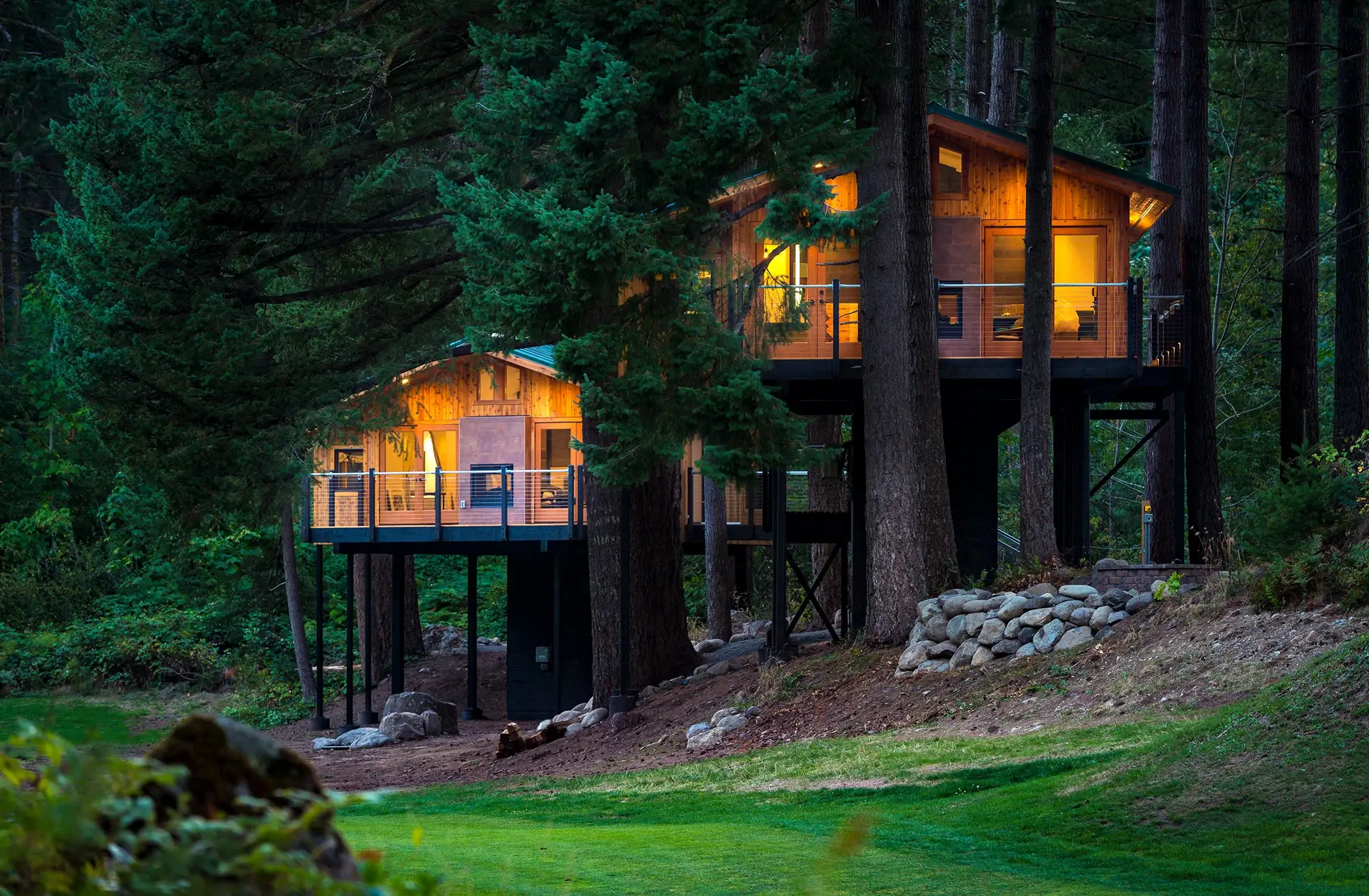 A wide view of an Allaway Events venue set for a large gathering, showcasing scenic surroundings, flexible event spaces, and a welcoming atmosphere designed for retreats and celebrations.